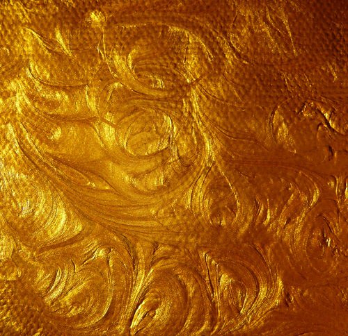 acrylic-gold-paint-swirl-stock