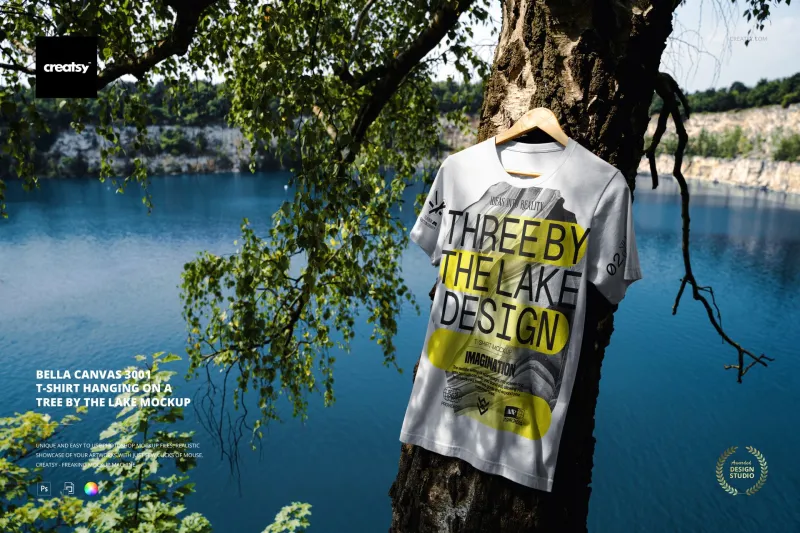 Free-Bella-Canvas-3001-T-shirt-Hanging-on-a-Tree-by-the-Lake-PSD-Mockup-698d624207f3d.webp
