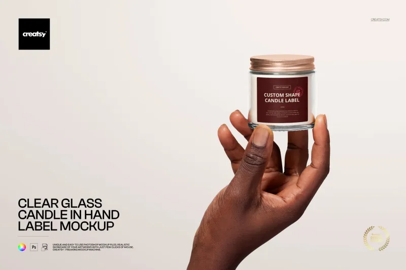 Free-Clear-Glass-Candle-Jar-in-Hand-Label-Branding-PSD-Mockup-698d6482ae8ab.webp